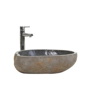 Lavabo Tauro de estilo contemporáneo fabricado en piedra en color arena.