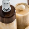 Set de aseo j 4 Neptuno de estilo contemporáneo fabricado en onix en color marfil combinado con madera de ébano.
