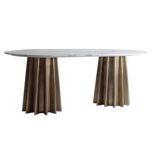 Mesa comedor Lezey de estilo art deco fabricado en mármol en color blanco combinado con acero en color oro. Producto desmontable.