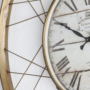 Reloj Greer de estilo art deco fabricado en hierro en color oro combinado con cristal.