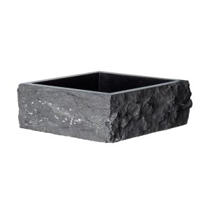 Lavabo Calypso de estilo contemporáneo fabricado en mármol en color negro.