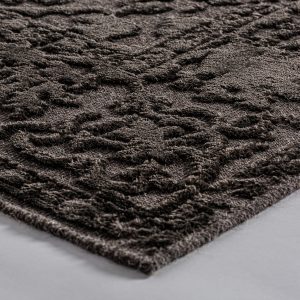 Alfombra Wera de estilo clásico fabricado en viscosa en color negro.