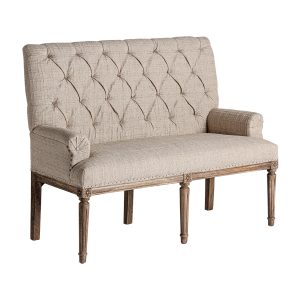 Sofá capitoné bar hestroff de estilo clásico fabricado en madera de mango en color beige combinado con poliéster y espuma.