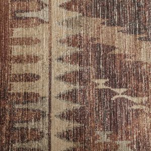 Alfombra agate de estilo colonial fabricado en viscosa en color tonos en marrón combinado con poliéster.