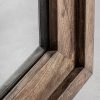 Espejo giekau de estilo colonial fabricado en madera abedul en color marrón combinado con espejo.
