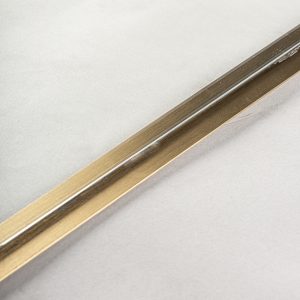 Espejo amelfot de estilo art deco fabricado en acero en color oro combinado con espejo.