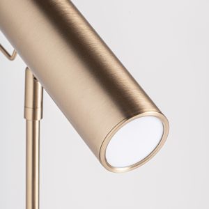 Lámpara de pie de estilo art deco fabricado en hierro en color oro combinado con mármol en color negro.