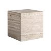 Mesa de centro Rapolano de estilo art deco fabricado en travertino en color beige con acabado mate.