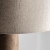 Lámpara de pie cogne de estilo contemporáneo fabricado en madera de mango en color marrón combinado con yute en color crema.