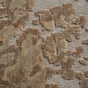 Alfombra jena de estilo clásico fabricado en viscosa en color tonos en marrón.