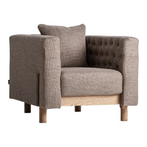 Sillón Carlton de estilo colonial fabricado en poliéster en color beige con acabado jaspeado combinado con madera de pino en color marrón claro y espuma.