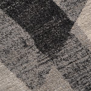 Alfombra Dabhe de estilo clásico fabricado en poliéster en color beige.