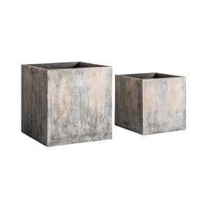 Macetero j 2 Arvit de estilo industrial fabricado en terracota en color tonos neutros con acabado patina. Producto apilable.