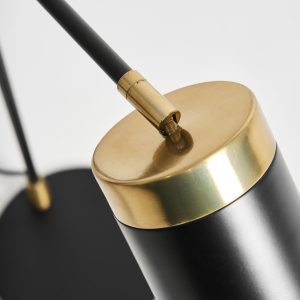 Lámpara de sobremesa Seb de estilo art deco fabricado en hierro en color negro en color oro.