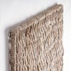 Panel decorativo Jerges de estilo boho fabricado en banano en color arena combinado con hierro.