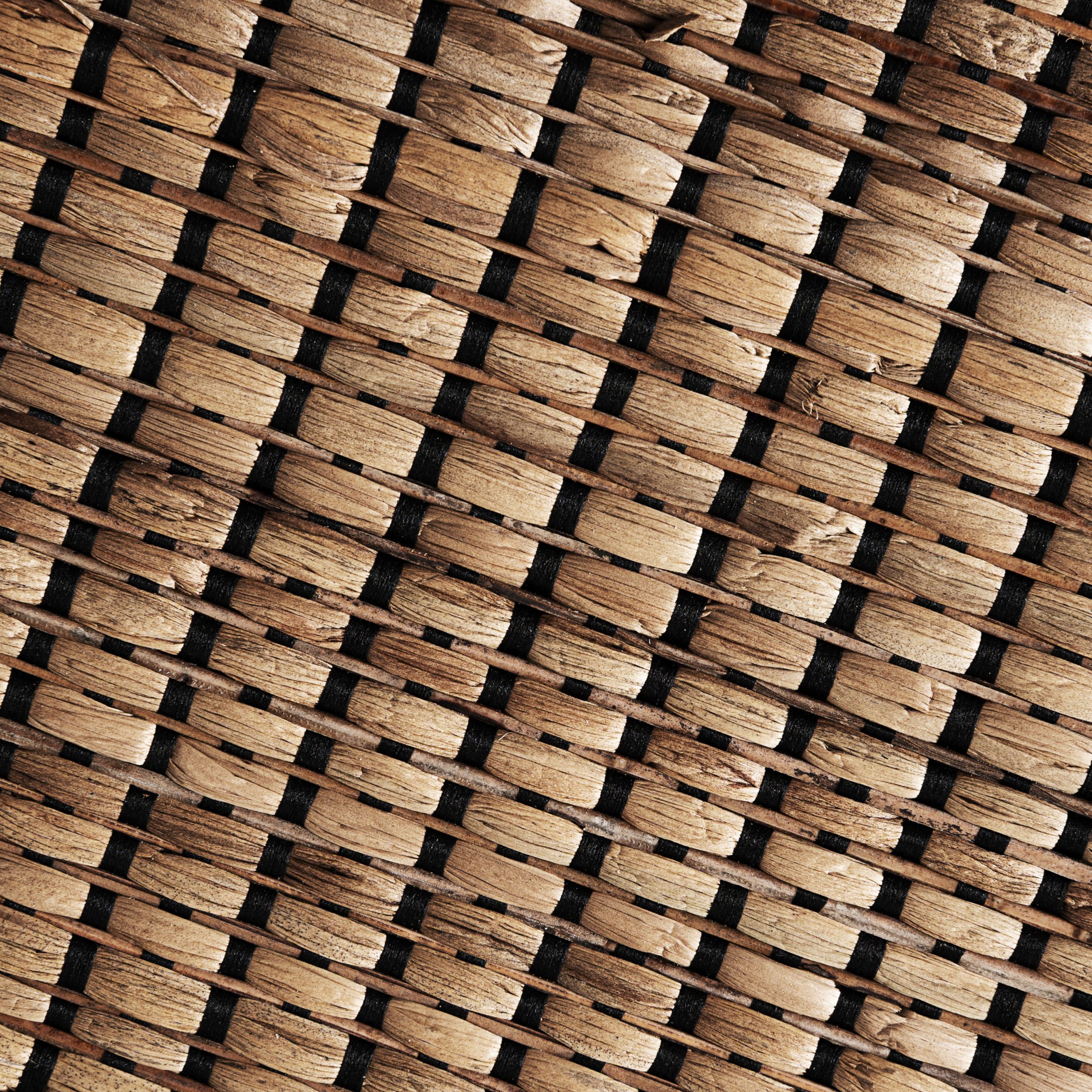 Panel decorativo Maurice de estilo boho fabricado en fibra natural en color marrón.