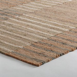 Alfombra Kaela de estilo clásico fabricado en yute en color tonos neutros combinado con algodón.