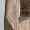 Escultura Teran de estilo étnico fabricado en madera suar en color marrón.