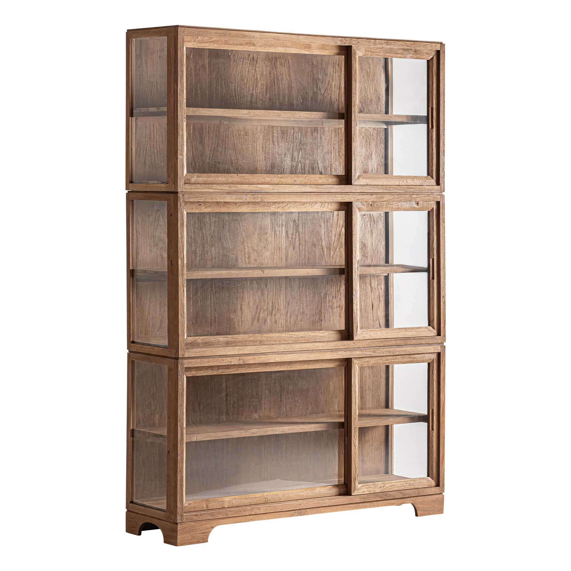 Vitrina Broich de estilo colonial fabricado en madera de teka en color marrón combinado con vidrio. Producto apilable.