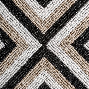 Figura decorativa Genhof de estilo boho fabricado en bambú en color tonos neutros combinado con hierro en color negro.